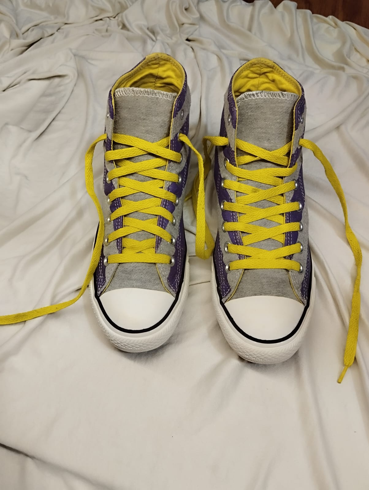 Grey and purple high rise converse